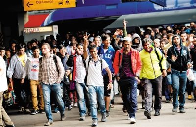 上周末两万难民涌入德国